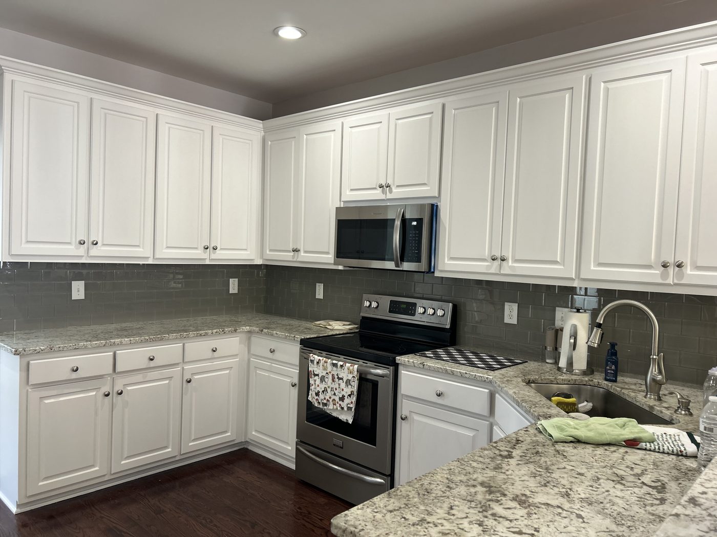 Kitchen cabinets refinished in white